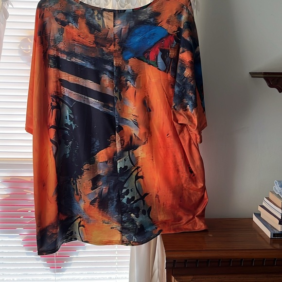 Orange and multicolored short sleeve top scoop neck size it say 4X. - Picture 2 of 2